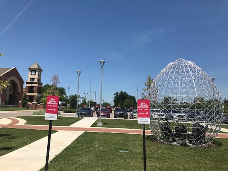Parking signs in parking lot