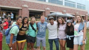 Students and staff gathered together for a group photo at Back to School Bash