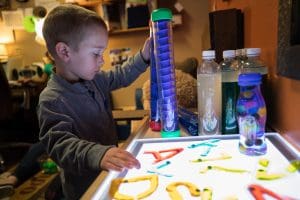 A preschool-age child plays