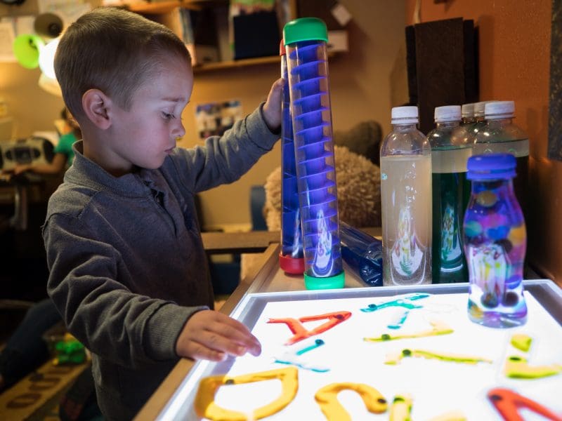 A preschool-age child plays