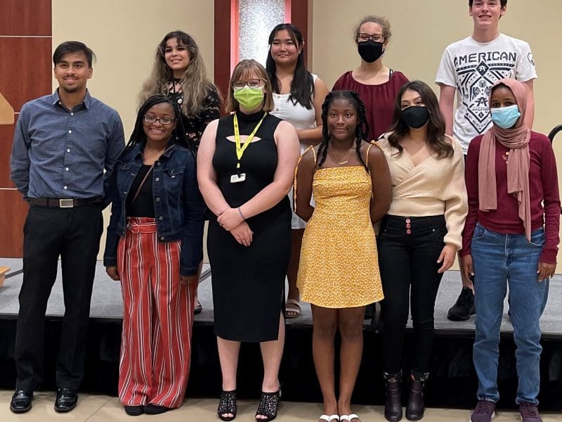 A picture of 10 students who received the Shocker Neighborhood Promise Scholarship.