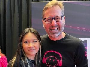 (Left to right) Picture of Wichita State University senior Truc Nguyen and T-Mobile for Business CEO Mike Sievert.