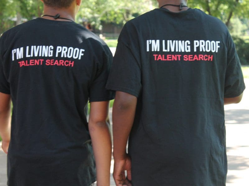 2 boys wearing shirts that state: I'm Living Proof- Talent Search on the back
