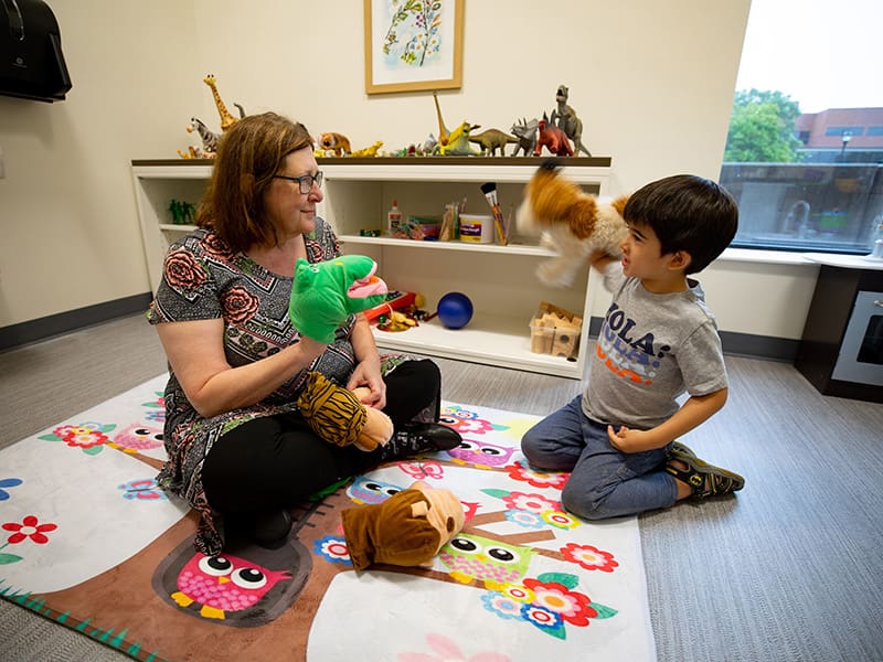 Dr. Jody Fiorini, chair of Intervention Services and Leadership in Education for Wichita State’s College of Applied Studies, works with a client at the WSU Integrated Support and Empowerment (WISE) Clinic.