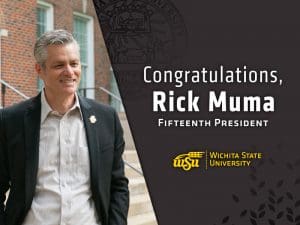 Dr. Rick Muma stands in front of Morrison Hall