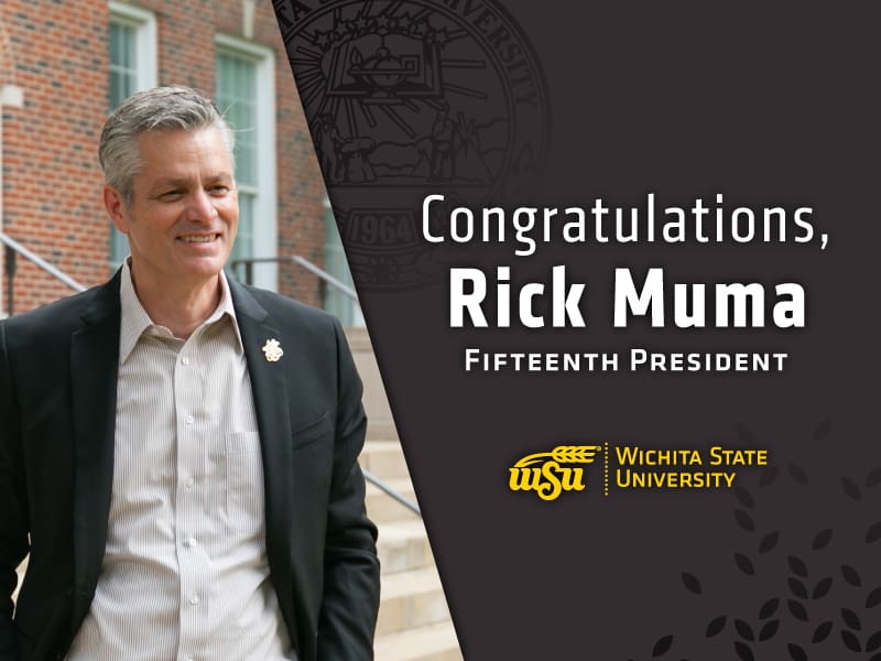 Dr. Rick Muma stands in front of Morrison Hall