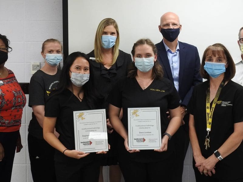 Junior Stephanie Thanh Pham and senior Elena Lovelace are the first two recipients of the Southcentral Pathology endowed scholarship.