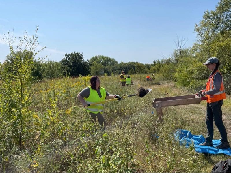 Wichita State archaeology students dig and sift through dirt that they excavated at North Chisolm Creek Park in Wichita. The dig was part of a cultural survey to ensure that no ancient artifacts would be destroyed when the city made infrastructure changes to the park.