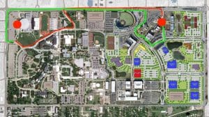 The red route begins in Braeburn Square, drives through campus, and drops off at the southern end of the Koch Arena parking lot. After the game, the green route picks up at the original drop off point to the south end of the parking lot, exits campus, and drives on 21st street back to Braeburn.