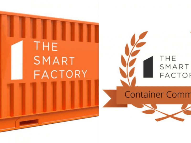 Image of orange shipping container with text Deloitte Smart Factory Design Contest.