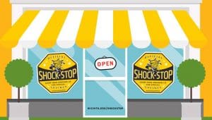 Image of illustrated store front featuring two green trees and two windows featuring Shock Stop logo.