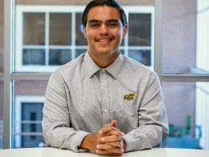 Picture of seated Nicolas Reyes.