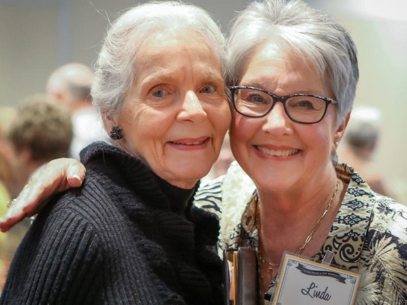 Retired faculty and staff reconnect at the event.