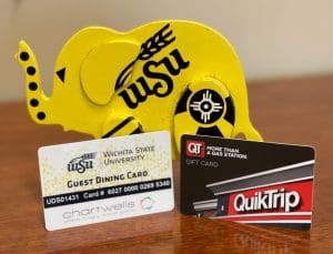 Image of Shocker elephant on table with a quick trip and shocker dollar gift card.