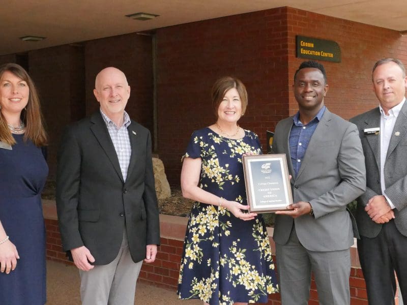 Image of Credit Union of America representatives Lea Ann Gabbert, Kym Money and Bradley Dyer.