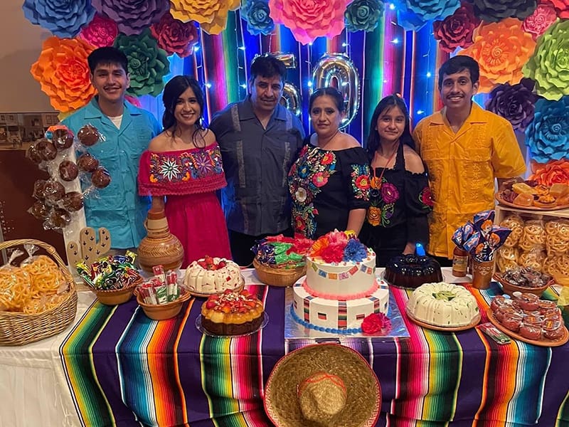 Image of Six member of the Aranda family attend a birthday party in Dodge City, Kansas, 2021.