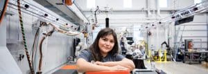 Image of female WSU Student working at lab.