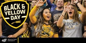 Image of WSU Students cheering during basketball game.