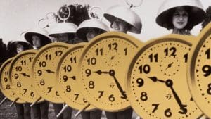 Image of people dressed up in alarm clock costumes.