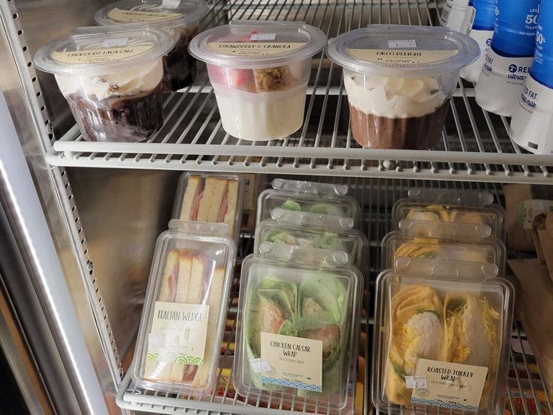 Image of new food items in cold case at the Shocker Store.