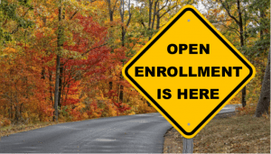 Image of road sign with text Open Enrollment is here.