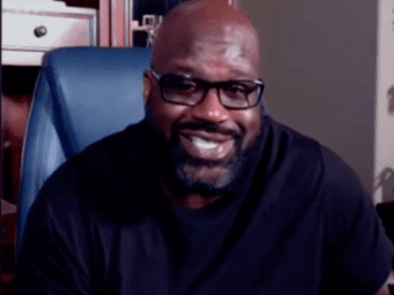 Image of Shaquille O'Neal sitting in chair