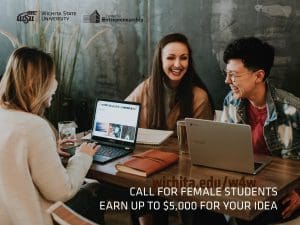 Three women sitting at a table with computers talking. "Call for female students. Earn up to $5,000 for your idea. wichita.edu/w4w"