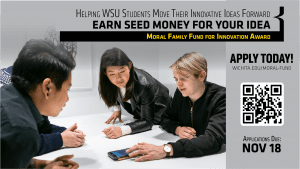 "Helping WSU Students move their innovative ideas forward. Earn seed money for your idea. Moral Family Fund for Innovation Award. Apply Today! wichita.edu/moral-fund. Applications Due: Nov 18" Four people sit around table leaning forward to look at something being shown on a phone.