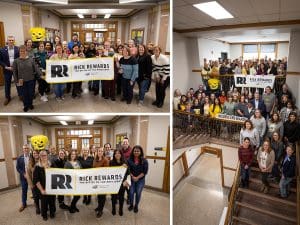 Groups with the president holding up Rick Rewards signs