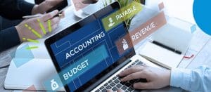 Image of laptop with the words Budget, Accounting, Payable, and Revenue listed.