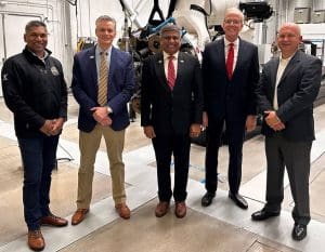 A photo of Sethuraman Panchanathan, National Science Foundation director, with President Rick Muma, U.S. Senator Jerry Moran, Waruna Seneviratne, ATLAS direct, and John Tomblin, senior vice president for Industry and Defense Programs and NIAR executive director.
