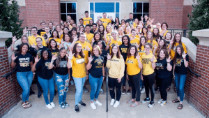 Photo of student ambassadors outside of the Marcus Welcome Center