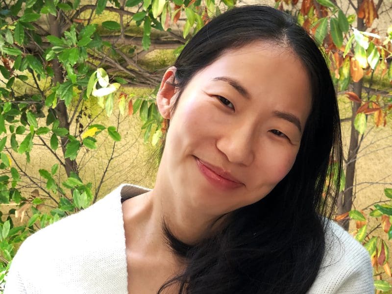 Photo of Cindy Juyoung posing in a spring setting.
