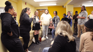 Photos of staff members, students and deaf community members laughing and smiling at each other during the event.