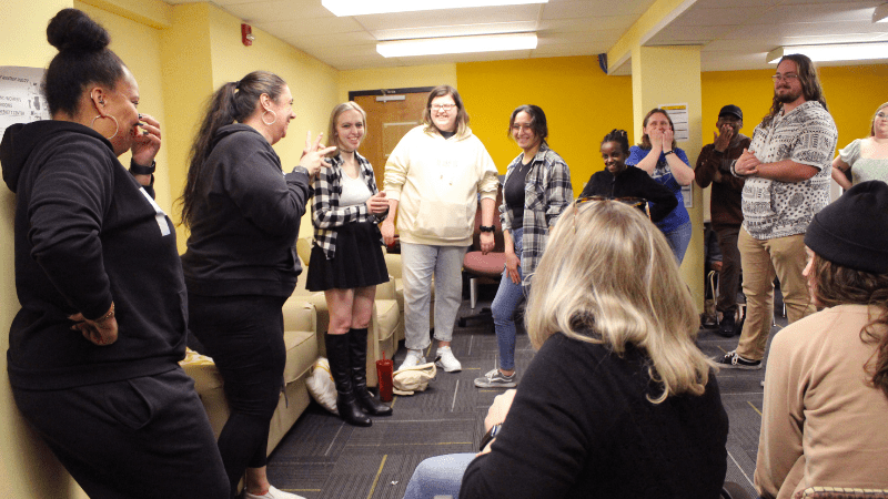 Photos of staff members, students and deaf community members laughing and smiling at each other during the event.