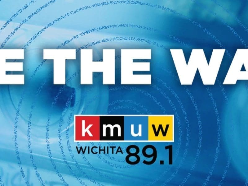 A graphic with the text, "Save The Waves" and the KMUW logo. "KMUW 89.1 FM," and a photo of a cassette tape as the backdrop.