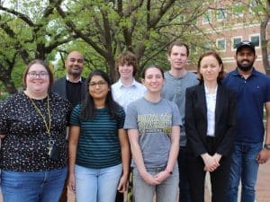 Photo of the members of the AeroFeathers team, Brittany Wojciechowski, Amulya Lomte, Laura Nobles, Dr. Maria Carrillo-Munoz, Dr. Bhisham Sharma, Gabrielle Mathews, Will Johnston and Pulitha Janith Chandrasena Godakawela Kankanamalage.