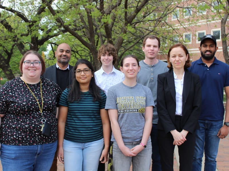 Photo of the members of the AeroFeathers team, Brittany Wojciechowski, Amulya Lomte, Laura Nobles, Dr. Maria Carrillo-Munoz, Dr. Bhisham Sharma, Gabrielle Mathews, Will Johnston and Pulitha Janith Chandrasena Godakawela Kankanamalage.