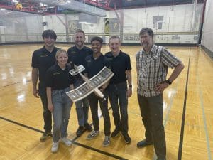 Photo of the first place team in undergraduate category, Trent Oberlander, Amanda Mudra, Alexander Dewerff, Gabriel Kimuri, Logan Mauch and Dr. Scott Miller.
