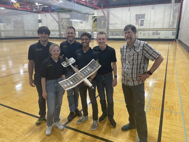 Photo of the first place team in undergraduate category, Trent Oberlander, Amanda Mudra, Alexander Dewerff, Gabriel Kimuri, Logan Mauch and Dr. Scott Miller.