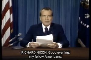 Former President Richard Nixon giving a speech on a 1960s-era television