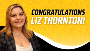 Yellow background with light yellow wheat pattern. Liz Thornton photo on left side with "Congratulation Liz Thornton!" on right side. Black and white border on bottom of image.