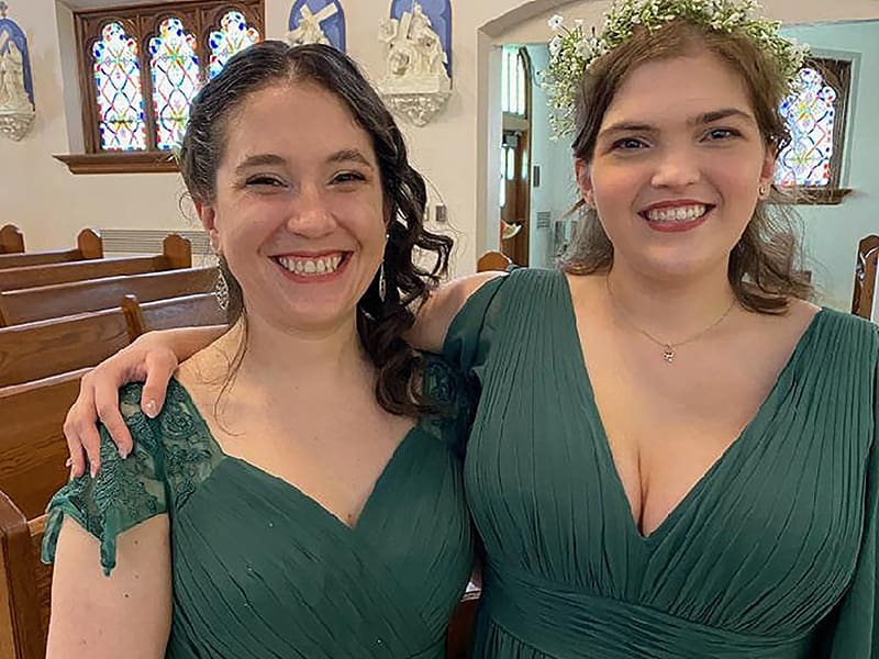 Photo of Alissa Haddock and Michelle Delaney at a wedding.