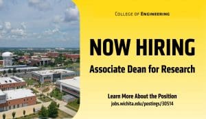 Aeriel view of buildings on campus. Right side has yellow background with words in black: Now Hiring, Associate Dean for Research
