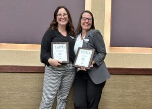 Taylor and Juliane with their awards
