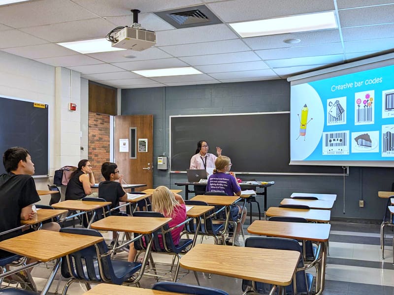 Dr. Mai Dao gives a presentation at a Math Circle session