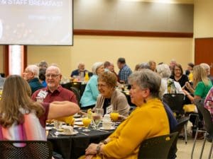 Retirees mingling at the WSU Retiree Association announcement