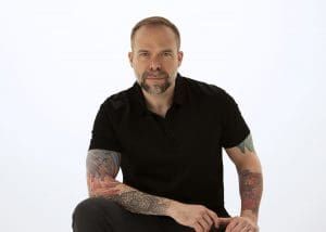Scholar David Getsy is pictured, dressed in black.