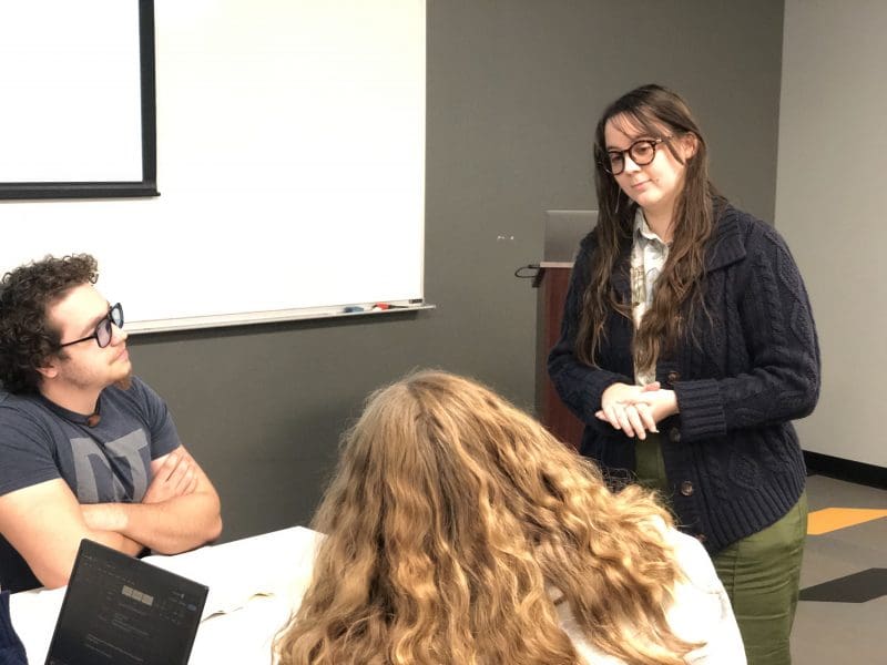 Casey Shotwell, assistant educator, providing free math assistance to students