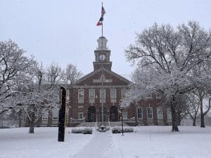 Morrison Hall on campus in the snow